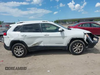 2015 Jeep Cherokee Latitude z VIN 1C4PJMCS3FW557734, wystawiony jako IAAI lot #42273937 z przebiegiem 168 828 mil mil oraz . Historia ofert i sprzedaży dostępna na DreamBid. Obrazek 13.