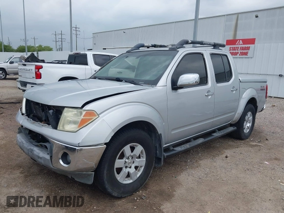 2005 Nissan Frontier LE with VIN 1N6AD07U25C457977, listed as a IAAI auction lot 41906592 with 256,116 mi miles and . Bid and sale history available at DreamBid. Image 2.