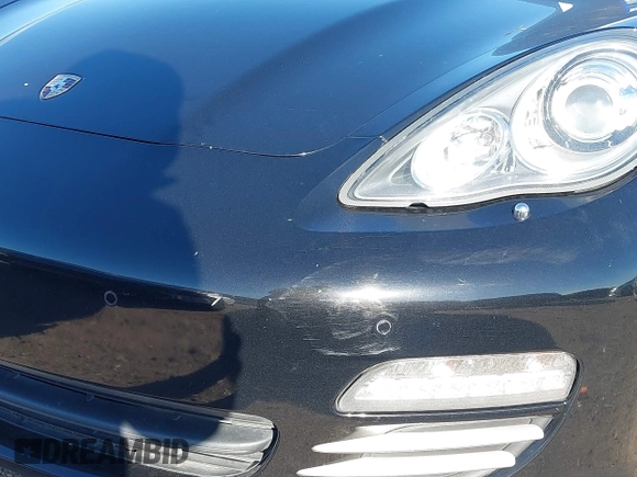 2012 Porsche Panamera с VIN WP0AA2A76CL018823, выставлен на аукционе IAAI как лот 41029754 с пробегом 120 261 миль миль и . История ставок и продаж доступна на DreamBid. Изображение 6.