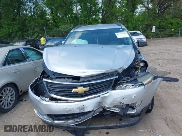 2014 Chevrolet Traverse LS z VIN 1GNKVFED1EJ334488, wystawiony jako IAAI lot #42199428 z przebiegiem 161 200 mil mil oraz . Historia ofert i sprzedaży dostępna na DreamBid. Obrazek 6.