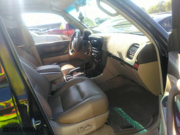 2001 Toyota Land Cruiser with VIN JTEHT05J512016563, listed as a IAAI auction lot 41868193 with 247,653 mi miles. Bid and sale history available at carsss.com. Image 5.