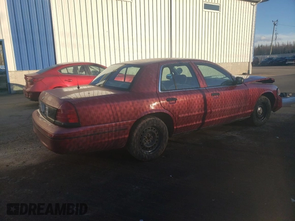 2000 Ford Crown Victoria Police Police Interceptor with VIN 2FAFP71W1YX118742, listed as a Copart auction lot 85001254 with 210,083 mi miles and Salvage Title. Bid and sale history available at carsss.com. Image 3.
