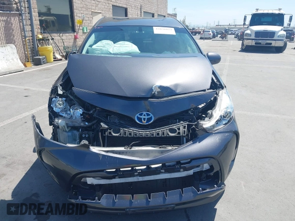 2015 Toyota Prius Two with VIN JTDZN3EUXFJ027926, listed as a IAAI auction lot 42036024 with 104,976 mi miles and . Bid and sale history available at DreamBid. Image 12.