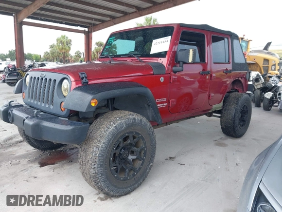 2012 Jeep Wrangler Unlimited Sport z VIN 1C4BJWDG3CL207291, wystawiony jako IAAI lot #42211454 z przebiegiem 110 864 mil mil oraz . Historia ofert i sprzedaży dostępna na DreamBid. Obrazek 18.