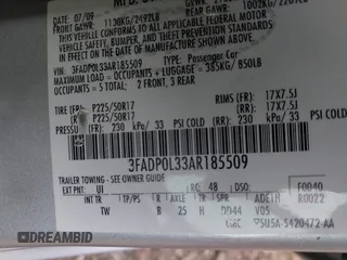 2010 Ford Fusion Hybrid with VIN 3FADP0L33AR185509, listed as a IAAI auction lot 41798825 with 155,934 mi miles. Bid and sale history available at carsss.com. Image 9.