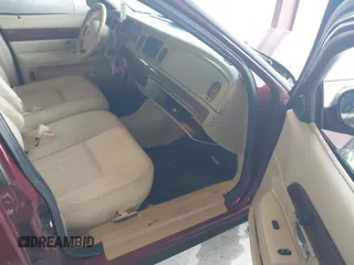 2006 Mercury Grand Marquis LS Premium z VIN 2MEHM75VX6X628404, wystawiony jako IAAI lot #42227639 z przebiegiem 170 132 mil mil oraz . Historia ofert i sprzedaży dostępna na DreamBid. Obrazek 5.