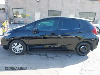 2015 Honda Fit LX with VIN 3HGGK5G5XFM737172, listed as a IAAI auction lot 42053332 with 80,690 mi miles and . Bid and sale history available at carsss.com. Image 14.