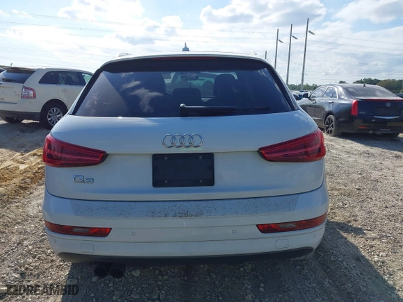 2018 Audi Q3 Premium with VIN WA1BCCFS6JR010047, listed as a IAAI auction lot 41795209 with 99,609 mi miles. Bid and sale history available at carsss.com. Image 16.