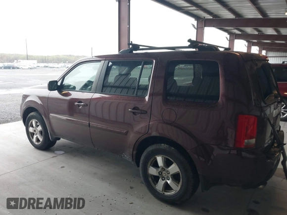 2009 Honda Pilot EX with VIN 5FNYF48499B005597, listed as a IAAI auction lot 41975121 with 309,769 mi miles. Bid and sale history available at carsss.com. Image 14.