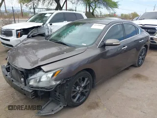 2014 Nissan Maxima S with VIN 1N4AA5AP0EC431251, listed as a IAAI auction lot 42120884 with 163,628 mi miles and . Bid and sale history available at DreamBid. Image 18.