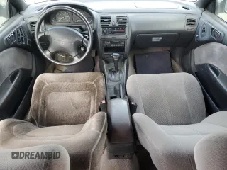 1997 Subaru Legacy L with VIN 4S3BK4359V7309059, listed as a Copart auction lot 59600835 with 136,620 mi miles and Salvage title. Bid and sale history available at DreamBid. Image 8.