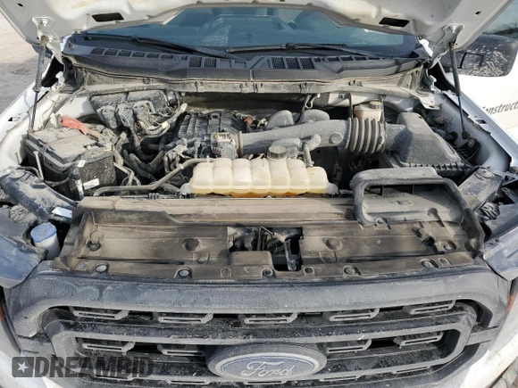 2023 Ford F-150 XL with VIN 1FTMF1CBXPKE33584, listed as a Copart auction lot 42448195 with 51,318 mi miles and Salvage title. Bid and sale history available at DreamBid. Image 11.