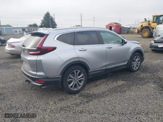 2021 Honda CR-V Touring with VIN 2HKRW2H9XMH212692, listed as a IAAI auction lot 41016640 with 24,149 mi miles. Bid and sale history available at carsss.com. Image 4.