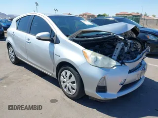 2012 Toyota Prius c One with VIN JTDKDTB34C1023043, listed as a IAAI auction lot 41858671 with 91,497 mi miles. Bid and sale history available at carsss.com. Image 1.