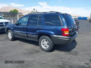 2004 Jeep Grand Cherokee with VIN 1J4GX48J74C283123, listed as a IAAI auction lot 42477393 with 182,491 mi miles and . Bid and sale history available at DreamBid. Image 3.