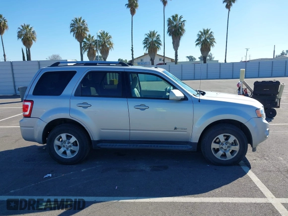 2009 Ford Escape Hybrid with VIN 1FMCU59349KA94375, listed as a IAAI auction lot 41865743 with 127,538 mi miles and . Bid and sale history available at DreamBid. Image 13.