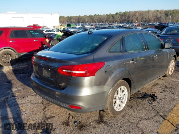 2017 Ford Focus SE with VIN 1FADP3F2XHL243550, listed as a IAAI auction lot 41752715 with 1 mi miles. Bid and sale history available at carsss.com. Image 4.