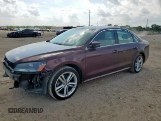 2014 Volkswagen Passat SE with VIN 1VWBT7A34EC032051, listed as a Copart auction lot 58267525 with 186,570 mi miles and Salvage title. Bid and sale history available at DreamBid. Image 1.