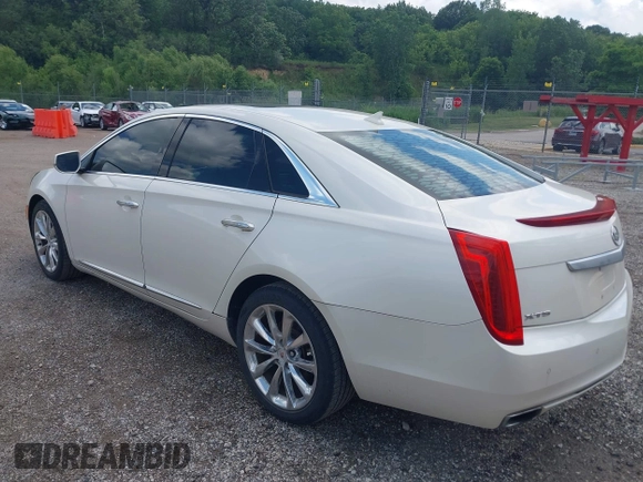 2013 Cadillac XTS Luxury with VIN 2G61P5S34D9138319, listed as a IAAI auction lot 42626756 with 88,743 mi miles and . Bid and sale history available at DreamBid. Image 3.