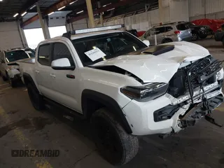 2019 Toyota Tacoma SR with VIN 5TFCZ5AN0KX209923, listed as a IAAI auction lot 41144153 with 50,605 mi miles and . Bid and sale history available at DreamBid. Image 1.