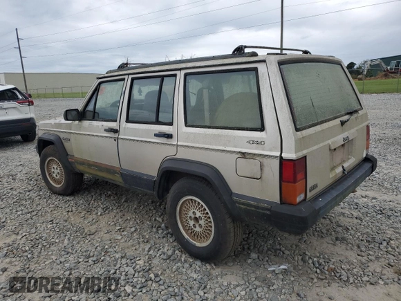 1995 Jeep Cherokee Sport with VIN 1J4FJ68S4SL618773, listed as a Copart auction lot 74126954 with 318,519 mi miles and Salvage title. Bid and sale history available at DreamBid. Image 2.