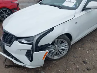 2023 Cadillac CT4 Premium Luxury z VIN 1G6DB5RK1P0129620, wystawiony jako IAAI lot #41568111 z przebiegiem 32 453 mil mil oraz . Historia ofert i sprzedaży dostępna na DreamBid. Obrazek 6.