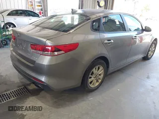 2018 Kia Optima S with VIN 5XXGT4L35JG209561, listed as a IAAI auction lot 42526577 with 161,906 mi miles and . Bid and sale history available at DreamBid. Image 4.