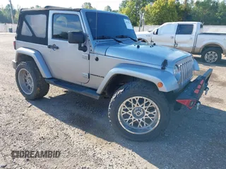 2016 Jeep Wrangler Sahara with VIN 1C4AJWBGXGL120329, listed as a IAAI auction lot 40239916 with 96,731 mi miles and . Bid and sale history available at DreamBid. Image 1.