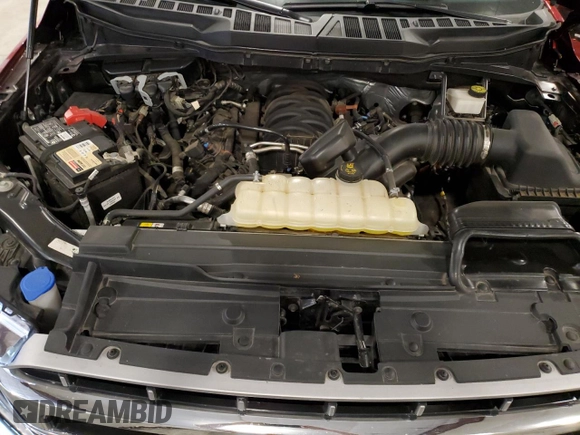 2021 Ford F-150 XL with VIN 1FTFW1E57MKE11716, listed as a Copart auction lot 61458915 with 47,080 mi miles and Salvage title. Bid and sale history available at DreamBid. Image 11.