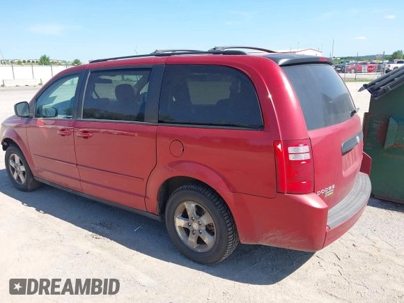 2009 Dodge Grand Caravan SE with VIN 2D8HN44E39R647787, listed as a IAAI auction lot 42609366 with 100,878 mi miles and . Bid and sale history available at DreamBid. Image 3.