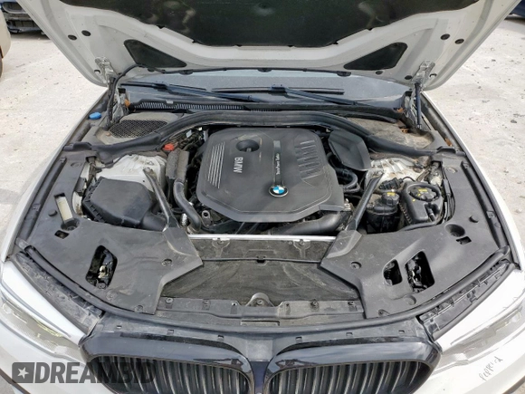 2018 BMW 5 Series 540i с VIN WBAJE5C58JG917669, выставлен на аукционе Copart как лот 57396815 с пробегом 117 967 миль миль и Списание • Salvage title. История ставок и продаж доступна на DreamBid. Изображение 11.
