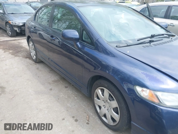 2010 Honda Civic LX with VIN 2HGFA1F52AH570385, listed as a IAAI auction lot 42234739 with 199,201 mi miles and . Bid and sale history available at DreamBid. Image 13.