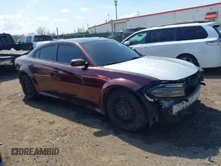 2018 Dodge Charger Police with VIN 2C3CDXKT3JH214872, listed as a IAAI auction lot 42078447 with 138,785 mi miles and . Bid and sale history available at carsss.com. Image 1.