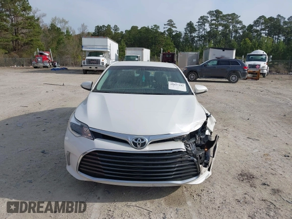 2016 Toyota Avalon Limited with VIN 4T1BK1EB8GU227552, listed as a IAAI auction lot 41857342 with 164,546 mi miles and . Bid and sale history available at carsss.com. Image 12.