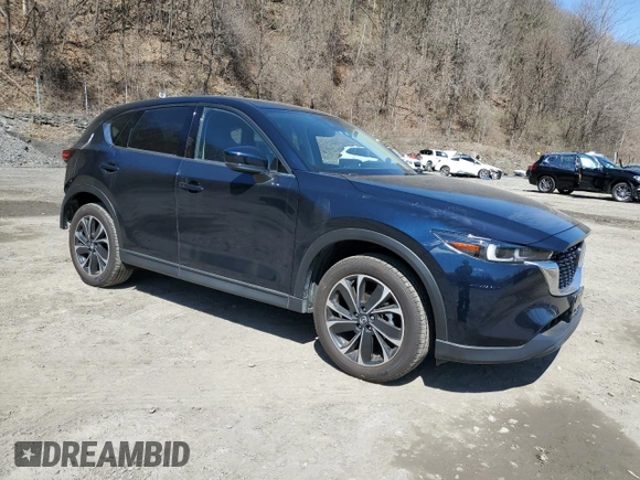 2022 Mazda CX-5 2.5 S Premium Plus Package with VIN JM3KFBEM6N0574048, listed as a Copart auction lot 52000625 with 21,039 mi miles and Salvage Title. Bid and sale history available at carsss.com. Image 4.