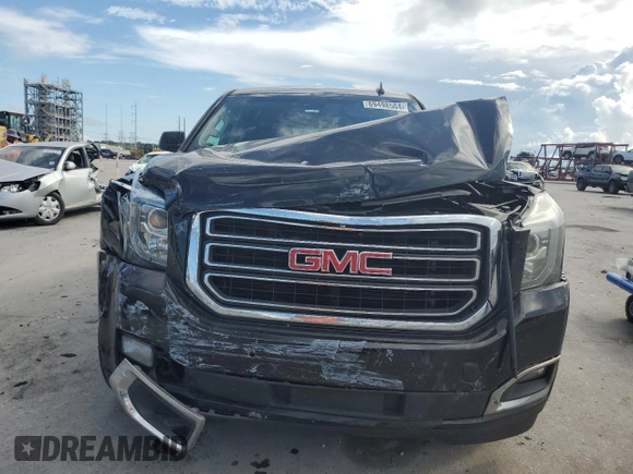 2019 GMC Yukon SLT with VIN 1GKS1BKC1KR155426, listed as a Copart auction lot 69498504 with 161,387 mi miles and Salvage Title. Bid and sale history available at carsss.com. Image 5.