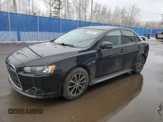 2015 Mitsubishi Lancer SE with VIN JA32V2FW9FU600579, listed as a Copart auction lot 47958205 with 165,250 mi miles and Salvage Title. Bid and sale history available at carsss.com. Image 1.
