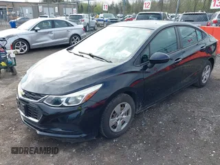2018 Chevrolet Cruze LS with VIN 1G1BC5SM6J7111831, listed as a IAAI auction lot 42149220 with 88,125 mi miles and . Bid and sale history available at DreamBid. Image 2.