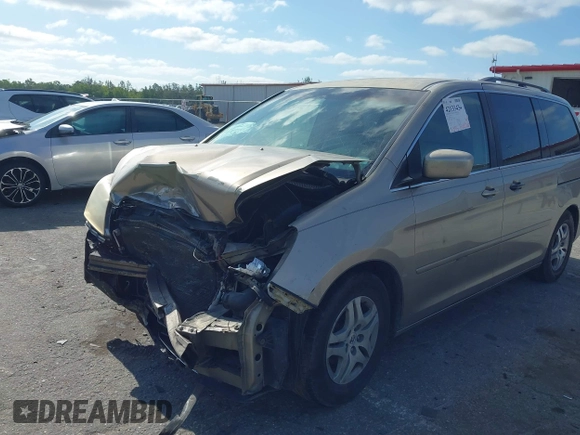 2005 Honda Odyssey EX with VIN 5FNRL38495B401742, listed as a IAAI auction lot 42133434 with 162,161 mi miles and . Bid and sale history available at carsss.com. Image 6.
