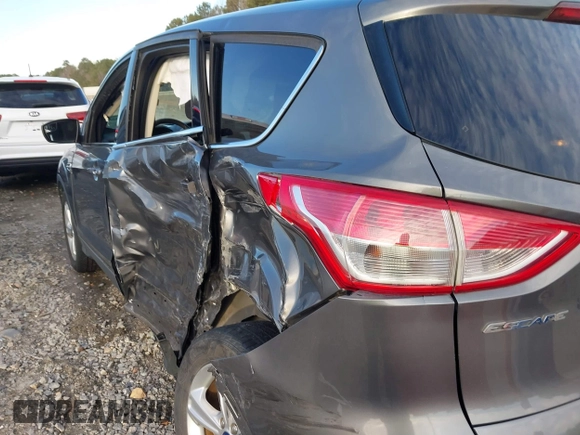 2014 Ford Escape SE with VIN 1FMCU9GX7EUD84797, listed as a IAAI auction lot 41430559 with 157,533 mi miles. Bid and sale history available at carsss.com. Image 19.