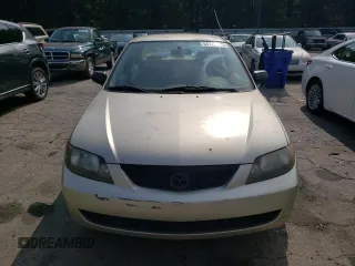 2003 Mazda Protege DX with VIN JM1BJ225X30107443, listed as a Copart auction lot 54777625 with 283,760 mi miles and Clean Title. Bid and sale history available at DreamBid. Image 5.