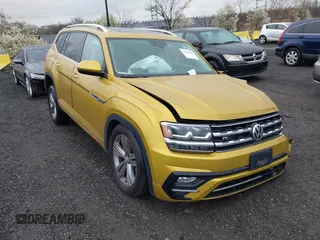 2018 Volkswagen Atlas 3.6L V6 SEL with VIN 1V2RR2CA0JC557938, listed as a IAAI auction lot 41964285 with 53,991 mi miles. Bid and sale history available at carsss.com. Image 1.