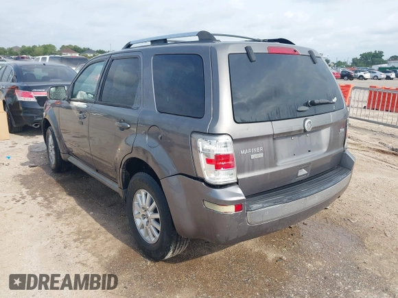 2011 Mercury Mariner Premier with VIN 4M2CN8HG3BKJ07656, listed as a IAAI auction lot 42369474 with 250,352 mi miles and . Bid and sale history available at DreamBid. Image 3.
