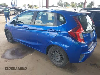 2015 Honda Fit LX z VIN 3HGGK5H51FM711607, wystawiony jako IAAI lot #42249495 z przebiegiem Nie podano mil oraz . Historia ofert i sprzedaży dostępna na DreamBid. Obrazek 3.
