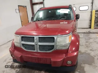 2008 Dodge Nitro SXT with VIN 1D8GU28K88W120319, listed as a IAAI auction lot 41683834 with 166,268 mi miles. Bid and sale history available at carsss.com. Image 13.