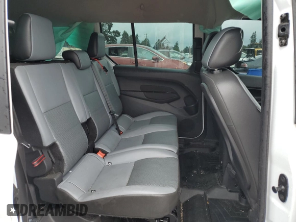 2018 Ford Transit Connect XL with VIN NM0GS9E74J1366779, listed as a Copart auction lot 61565865 with 106,491 mi miles and Salvage title. Bid and sale history available at DreamBid. Image 11.