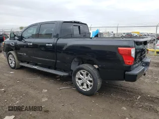 2016 Nissan Titan XD Platinum Reserve with VIN 1N6BA1F29GN512094, listed as a Copart auction lot 84119894 with 121,893 mi miles and Clean Title. Bid and sale history available at carsss.com. Image 2.