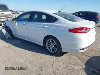 2018 Ford Fusion SE with VIN 3FA6P0H71JR262575, listed as a IAAI auction lot 41408259 with 96,624 mi miles and . Bid and sale history available at DreamBid. Image 3.
