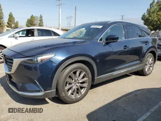 2021 Mazda CX-9 Carbon Edition with VIN JM3TCBDY1M0523945, listed as a Copart auction lot 60658395 with 75,879 mi miles and Salvage title. Bid and sale history available at DreamBid. Image 1.