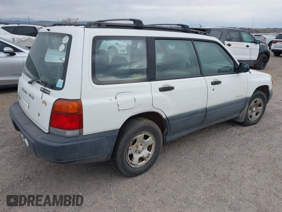 1998 Subaru Forester L with VIN JF1SF635XWH753021, listed as a IAAI auction lot 41541975 with 236,425 mi miles. Bid and sale history available at carsss.com. Image 4.